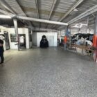 Commercial warehouse flake epoxy floor by Epoxee