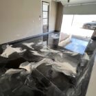 Metallic epoxy garage floor installed by Epoxee in El Paso, TX