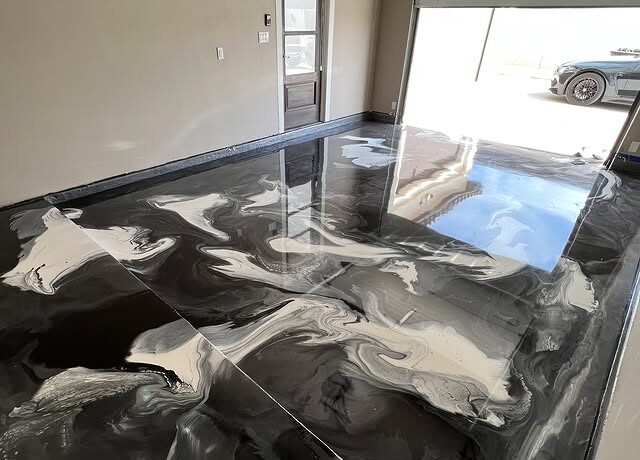 Metallic epoxy garage floor installed by Epoxee in El Paso, TX