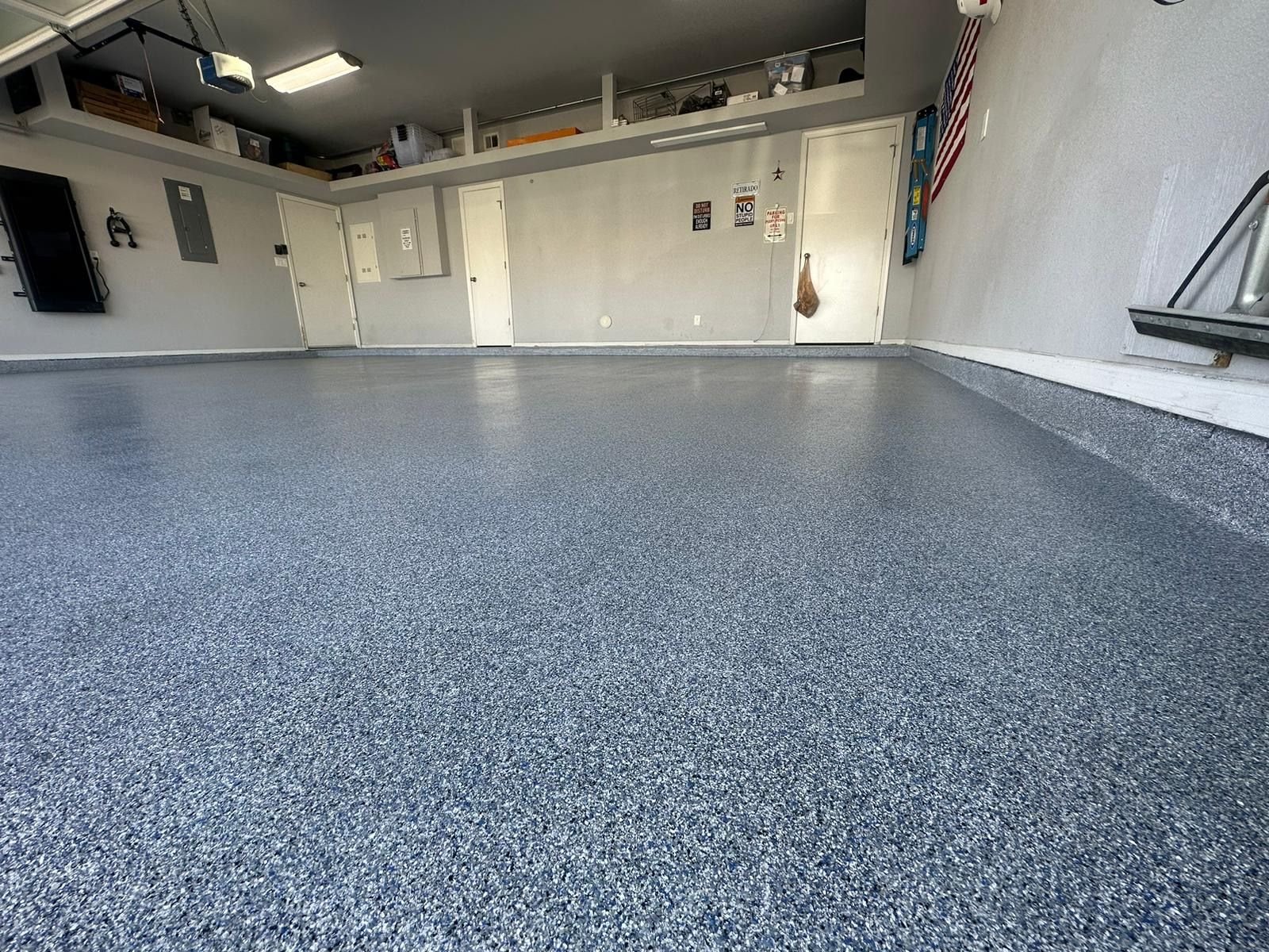 Blue-gray flake epoxy garage floor color installed by Epoxee in an El Paso, TX garage