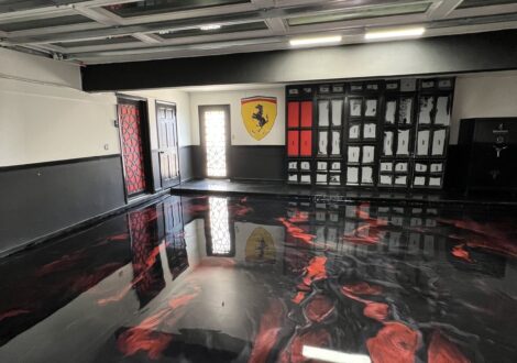 Custom Red and Black Metallic Epoxy Game Room installed by Epoxee in El Paso, TX