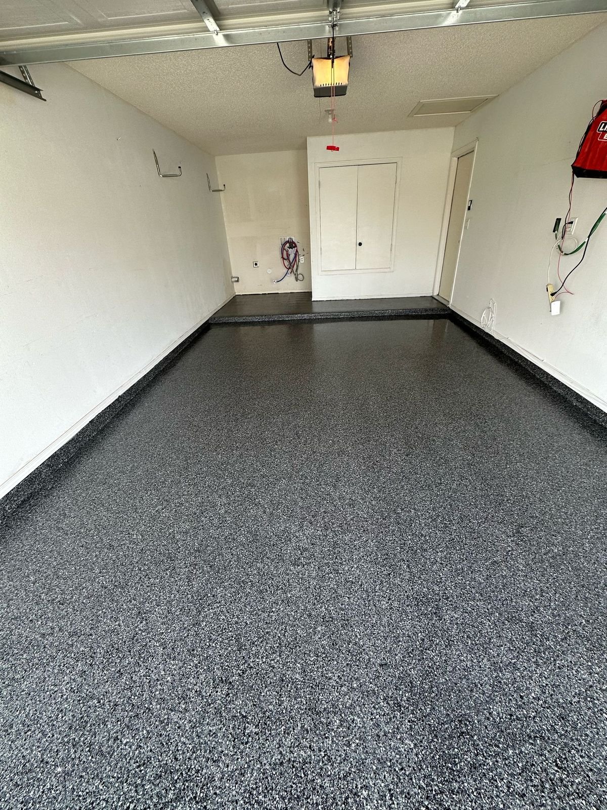 Dark Gray Flake Epoxy Garage Floor installed by Epoxee in El Paso, TX