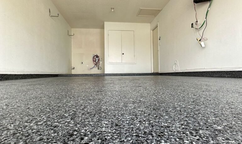Gray and White Flake Epoxy Garage Floor installed by Epoxee in El Paso, TX