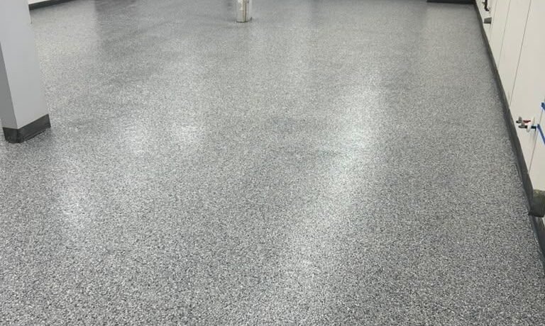 Gray Flake Epoxy Garage Floor installed by Epoxee in El Paso, TX