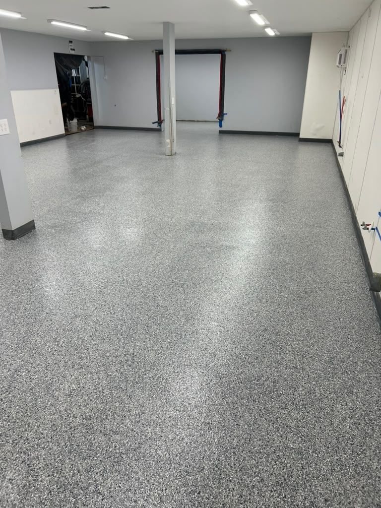 Gray Flake Epoxy Garage Floor installed by Epoxee in El Paso, TX
