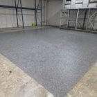Light flake epoxy garage floor by Epoxee in El Paso, the kind of epoxy garage floor jack stands sit on