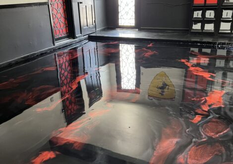 Red and Black Metallic Epoxy Game Room installed by Epoxee in El Paso, TX