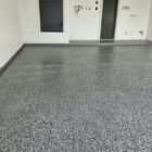 No bubbles in epoxy garage floor coating on this Epoxee wombat flake garage in El Paso, coated on a cooling slab
