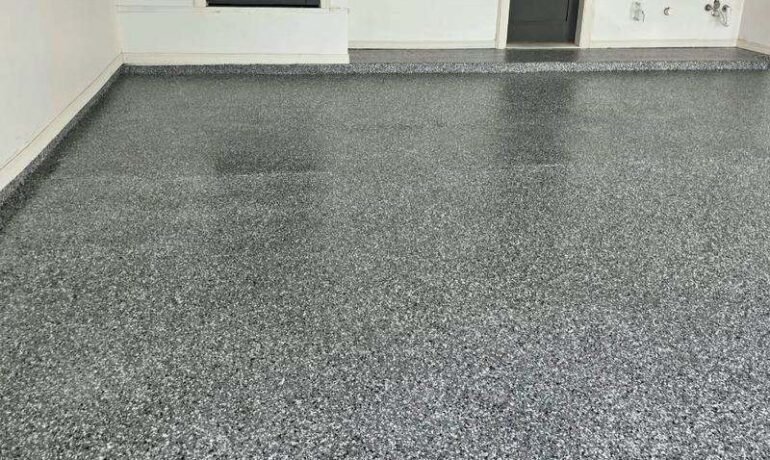 No bubbles in epoxy garage floor coating on this Epoxee wombat flake garage in El Paso, coated on a cooling slab